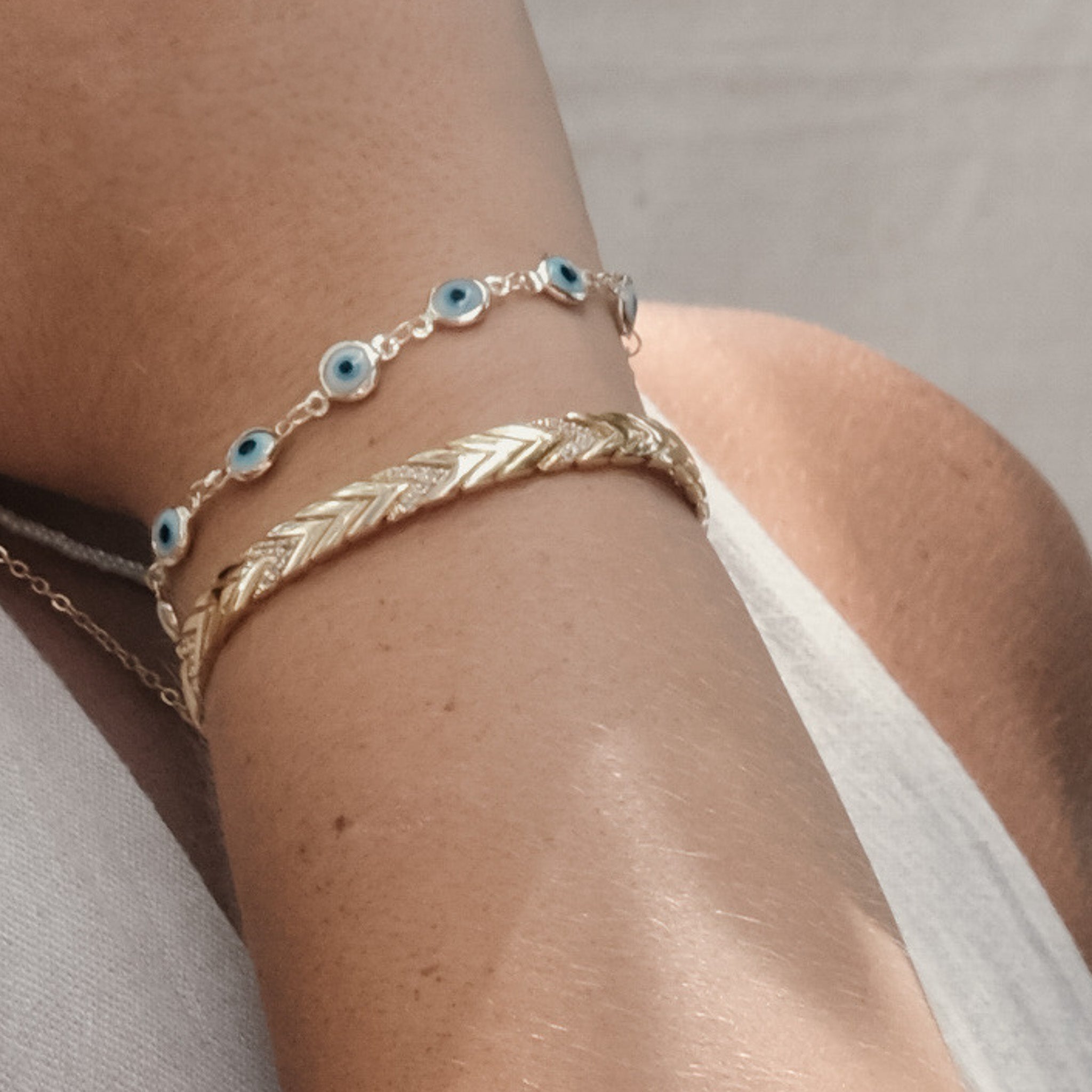 EVIL EYE MULTI PENDANT BRACELET